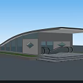 Modern Station Exterior Design With Curved Roof Glass Wall Escalators And Lawn Steps