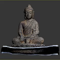 Sitting Buddha Statue On Carved Stone Base With Antique Bronze Finish