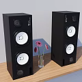 Black Musical Instruments And Art Supplies On Wooden Tabletop With Flower Vase