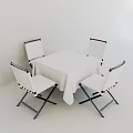 Foldable Leisure Chairs With White Seats And Black Frames Around Square Table 3d model