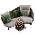 Curved Multi Person Sofa with Woven Frame Gray Cushions Green Pillows and Plaid Blanket