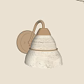 Elegant Vintage Brass Wall Lamp With White Textured Shade On Beige Wall