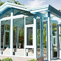 Modern Villa Balcony With Glass Structure And Surrounding Green Plants