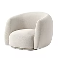 Beige Accent Chair Upholstered in Soft Bouclé Fabric with Rounded Design and Armrests