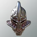 Metallic Mythical Warrior Helmet With Intricate Flame Decorations And Skull Like Face