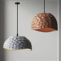 Stylish Textured Brown and Gray Hemispherical Pendant Lights with Shiny Surface on White Wall