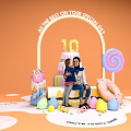 Art Installation for 10th Birthday Celebration with Arch Cake Lollipop Donut and Easter Eggs