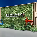 Lush Green Plant Wall with Wooden Stripe Background and Decorative Deer Statues