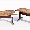 Two Rustic Wooden Tables With Patterned Tops And Dark Angled Legs