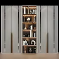 Modern Bookcase With Glass Doors And Metal Frame Displaying Decorative Items And Books