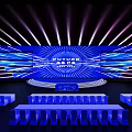 Modern Stage Setup Featuring Blue Screen Displaying China Price And Neatly Arranged Blue Seats