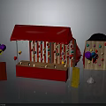 Red Tent Game Booth Structure With Colorful Balloons And Wooden Ring Toss Sign