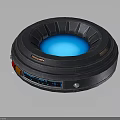 Futuristic Circular Metallic Component With Blue Glowing Core And Vented Framework 3d model