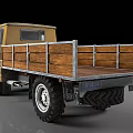 Vintage Yellowish Brown Truck Featuring Wooden Cargo Bed Large Tires and Classic Design