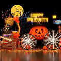 Halloween Photo Spot With Happy Halloween Sign Carved Pumpkin And Wheel Decorations