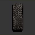Car Tire With Black Alloy Wheel Rim And Detailed Tread Pattern Design