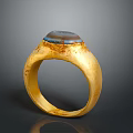 Vintage Gold Fashion Accessory Ring With Textured Band And Blue Brown Stone On Top