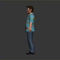 Man Wearing Blue Floral Shirt And Blue Jeans Standing Against Grey Background