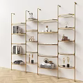 Stylish Modern Gold Bookshelf With Multiple Shelves Books And Decor Items