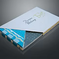 Elegant Lifestyle Book With White Cover Dine Signature Lifestyle Text Blue Gray Patterned Inner Pages