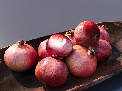 Fresh Juicy Ripe Red Pink Pomegranates Arranged on a Wooden Plate 3d model