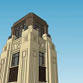 Beige Tower with Brown Roof Windows Decorative Carvings and Exterior Design