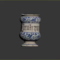 Ceramic Sculpture Vessel Featuring Carved Floral Patterns And Blue White Design
