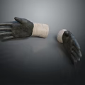 A Pair Of Black Working Gloves With Beige Wrist Part For Daily Use
