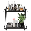 Modern Black Bar Cart Decor Setup With Wine Bottles Metal Containers Green Plant And Glasses