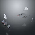 Various Shapes Sizes Gray White Orange Electronic Equipment on Dark Background with Connecting Cables
