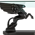 Elegant Coffee Table With Glass Top And Black Pegasus Base Design