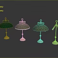 Chandeliers With Different Designs Green Light Green Plaid Pattern Shades Metal Bases Dark Background Reflections