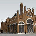 Historic Red Brick Building With Arched Windows And Decorative Towers