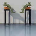 Elegant Interior Featuring Hinged Doors With Potted Plants On Black Stands