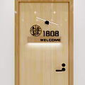 Elegant Wall Decor With Circular Design Number 1808 And Welcome Sign On Wooden Door