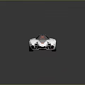 Futuristic White Sports Car With Red Wheels And Angular Sleek Design