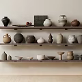 Ceramic Vessels in Various Shapes Displayed on Wooden Shelves for Home Interior