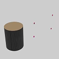 Black Cylindrical Coffee Table With Vertical Striped Design And Golden Top Bottom Borders