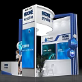 MOAMO Exhibition Booth Design With Blue White Curved Top Models Plants And Tables