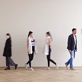 Group of People Walking In Indoor Space With Casual And Formal Attire On Wooden Floor 3d model