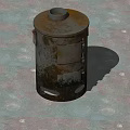 Rusty Metal Stove With Top Opening Side Handles And Vent Holes