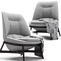Gray Leisure Chair with High Back Pleated Plush Cushion Dark Wooden Legs and Patterned Blanket