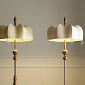 Two Modern Floor Lamps with Wooden Poles Decorative Balls and Light Lampshades in Minimalist Interior