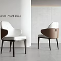 Avant-garde Modern Dining Chairs With White And Brown Leather Upholstery And Dark Wooden Legs