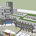 Modern Multi Story Building With Gray Exterior Green Roof Entrance Area And Surrounding Trees