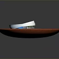 Modern Home Decor Item With Red Textured Circular Base And White Top