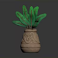 Ornate Clay Pot With Green Long Leaves And Intricate Carved Patterns