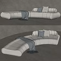 Cozy Modern Curved Sectional Sofa Light Colored With Gray Pillows And Throw Blanket 3d model
