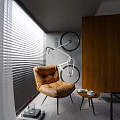 Modern Brown Leather Bean Bag Chair Interior With Side Table Coffee Cup And Wall Bicycle