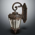 Vintage Ornate Wall Light With Curved Metal Frame And Glass Shade